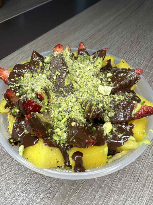 Dubai chocolate with mango and strawberry bowl